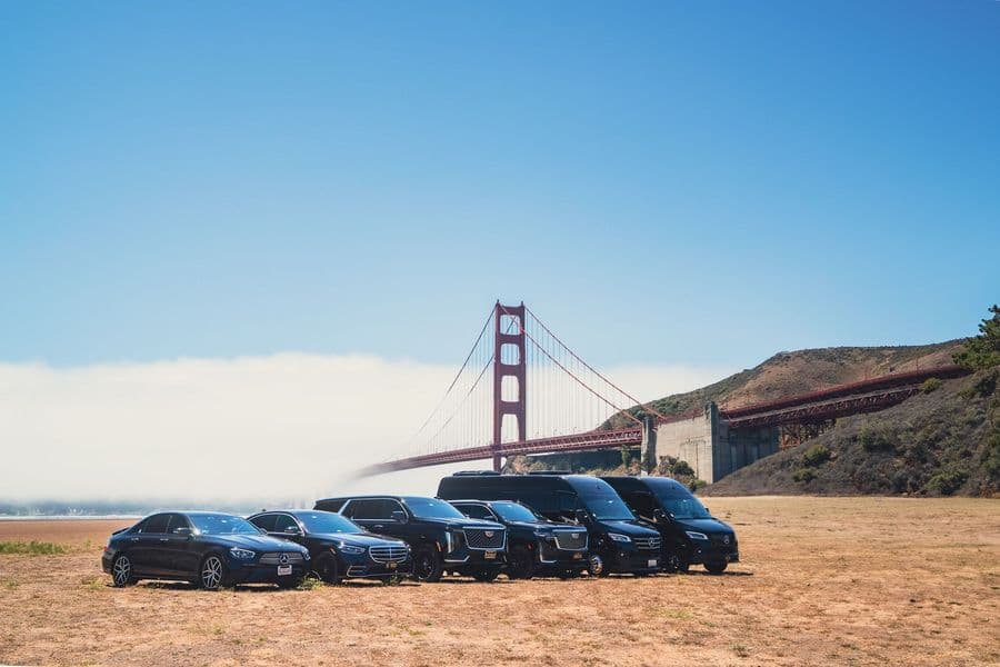 NorCal Luxury Chauffeur fleet — sedans, executive SUVs and Mercedes-Benz Sprinter vans at the Golden Gate Bridge, San Francisco